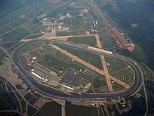 Talladega Superspeedway aerial view; the track was built on the site of an old airport, with two runways still visible