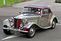 MG TD c.1953, with manual soft top and manually detachable sidescreens with clear plastic windows and Perspex rear window