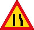 Road narrows on right side