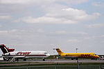 Apron VII with a Purolator Boeing 727 on the left, and a DHL MD-80 on the right.