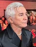 A picture of Baz Luhrmann smiling towards the camera