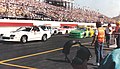 On pit road. This filming took place during the 1989 Autoworks 500 at Phoenix International Raceway. The safety car is the actual track safety car used for the race.