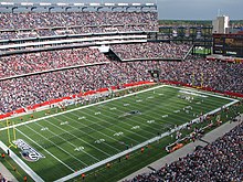 Football game in a full professional league stadium