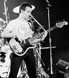 Deacon performing with Queen at the RDS Arena, Dublin in 1979.