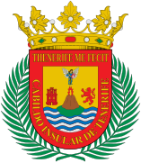 Escudo de la isla de Tenerife, con el Teide en erupción en el centro.