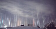 Light pillars caused by artificial lights, over North Bay Ontario, Canada