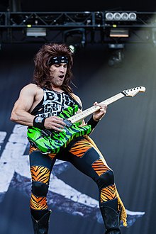 Satchel performing with Steel Panther in 2017