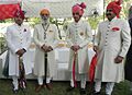 Achkan sherwani and churidar (lower body) worn by Arvind Singh Mewar and his kin during a Hindu wedding in Rajasthan, India, are items traditionally worn by the elites of the Indian subcontinent.