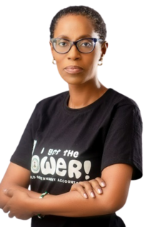 photograph of woman with short hair and glasses, crossed arms