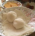 Neer dosa with two rice balls on it