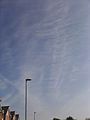 Contrail spread out by upper winds, Manchester, England, May 13, 2010.