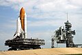 A crawler-transporter transporting a shuttle to the launchpad.