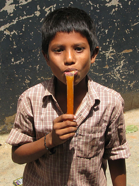 File:Boy eating freezie (cropped).jpg