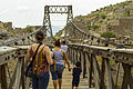 People crossing the bridge