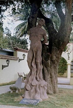 Monument of Taino chief Hatuey in Yara, depicting the moment he was burnt by Spanish soldiers. Bind to a Tamarind tree planted in 1907.