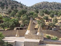 Conical roofs characteristic of Yazidi sites mark the tomb of Şêx Adî in Lalish