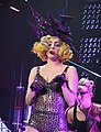 «Beautiful, Dirty, Rich» Gaga añade a su atuendo un sombrero de rayos purpura con brillos, mientras suena la canción lady gaga escala un cubo con luces, luego se quita el sombrero y se baja del cubo y va hacia la punto del escenario. y hace un breve discurso