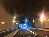 Color photo of the same tunnel