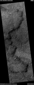 Edge of lava flow, as seen by HiRISE under HiWish program. Location is Solis Planum in Phoenicis Lacus quadrangle.