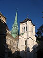 A picture of part of the Geneva Cathedral, showing some of its varied architecture.