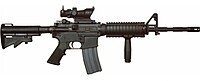 A Colt M4 Carbine with ACOG scope.