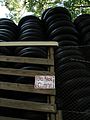 Thousands of inner tubes form an impressive tower. The tubes are literal "inner tubes" from tires.