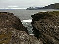 View from Culloo Rock. Dingle Peninsula, Dingle Bay and the north shore of Valentia Island (including Folger Cliffs) are in the background.