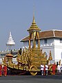 A 7-tiered umbrella over the urn of Princess Bejaratana Rajasuda as it is moved to the Great Chariot of Victory