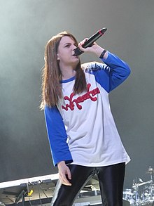 Blackery onstage, singing