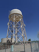 Water Tower at Williams Air Force Base (now Arizona State University at the Polytechnic campus). The water tower was constructed in the winter of 1941–1942 by the Del E. Webb Construction Company. The water tower possesses the associative quality that connects it to the history of Williams Air Force Base. Listed in the National Register of Historic Places – 1995. Reference 95000745