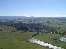 Mt Quincan, viewed from the southeast, showing the southern quarry with the main scoria cone behind it and the low-lying crater to the east.