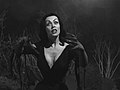 "Vampire Girl" (Vampira) attacks Inspector Clay