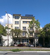 Mixed use Mediterranean Revival style building built in the 2010s