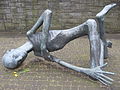 Image 6The sculpture „Der sterbende Häftling“ (The Dying Prisoner) at the memorial site of the Neuengamme concentration camp. The camp operated from 1938 to 1945 in the Neuengamme neighbourhood of Hamburg. (from History of Hamburg)