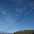 Vapour trail casts shadow