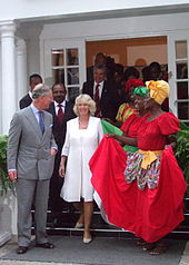 Charles and Camilla stand next to each other.