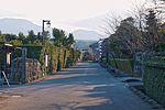 Small street lined by walls.