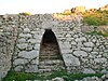 Postern gate of the Royal Palace of Ugarit with 25 degrees leaning walls.