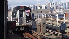 R160 F train approaching Smith-9th Streets after renovation.