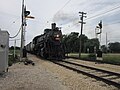 Frisco 1630 crossing Olson Road in front of the museum