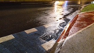 Wet streets with new and first bike lane