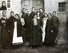 Members of the American Board, including Stella Loughridge (first on the left), teacher Susan Orvis (second from the left), and Henry Wingate (sixth from the left), along with other NER staff, Talas-Kayseri, 1919.