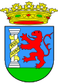 Versión del escudo de la ciudad de Badajoz, que fue sustituida en la heráldica oficial por otra similar a la que también tuvo el escudo provincial. Habría otro modelo de similares características.