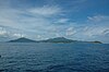 Photograph of forested islands as seen from sea