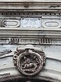 Details of sculpture on top of the main arch portal