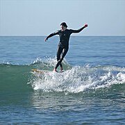 Lady surfer in Pacific Beach, California