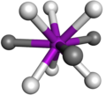 ejemplo de geometría prismática trigonal triapicada, los ligandos que apuntan a las caras del prisma aparecen en color oscuro.