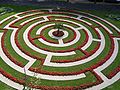 Paving labyrinth, turf, annual begonias. Boulogne-sur-Mer.