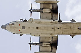 Underside of a USAF AC-130U; note the 25mm, 40mm and 105mm guns; and sensors.