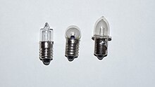 Three miniature bulbs: tubular bulb with screw base, globular bulb with screw base, and prefocus bulb with flange-mount base